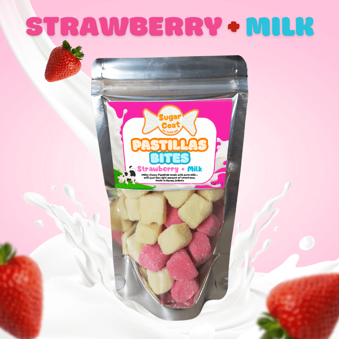 Silver pouch of pink and white strawberry milk pastillas bites with milk splashes and strawberries.
